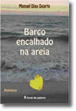 Barco encalhado na areia